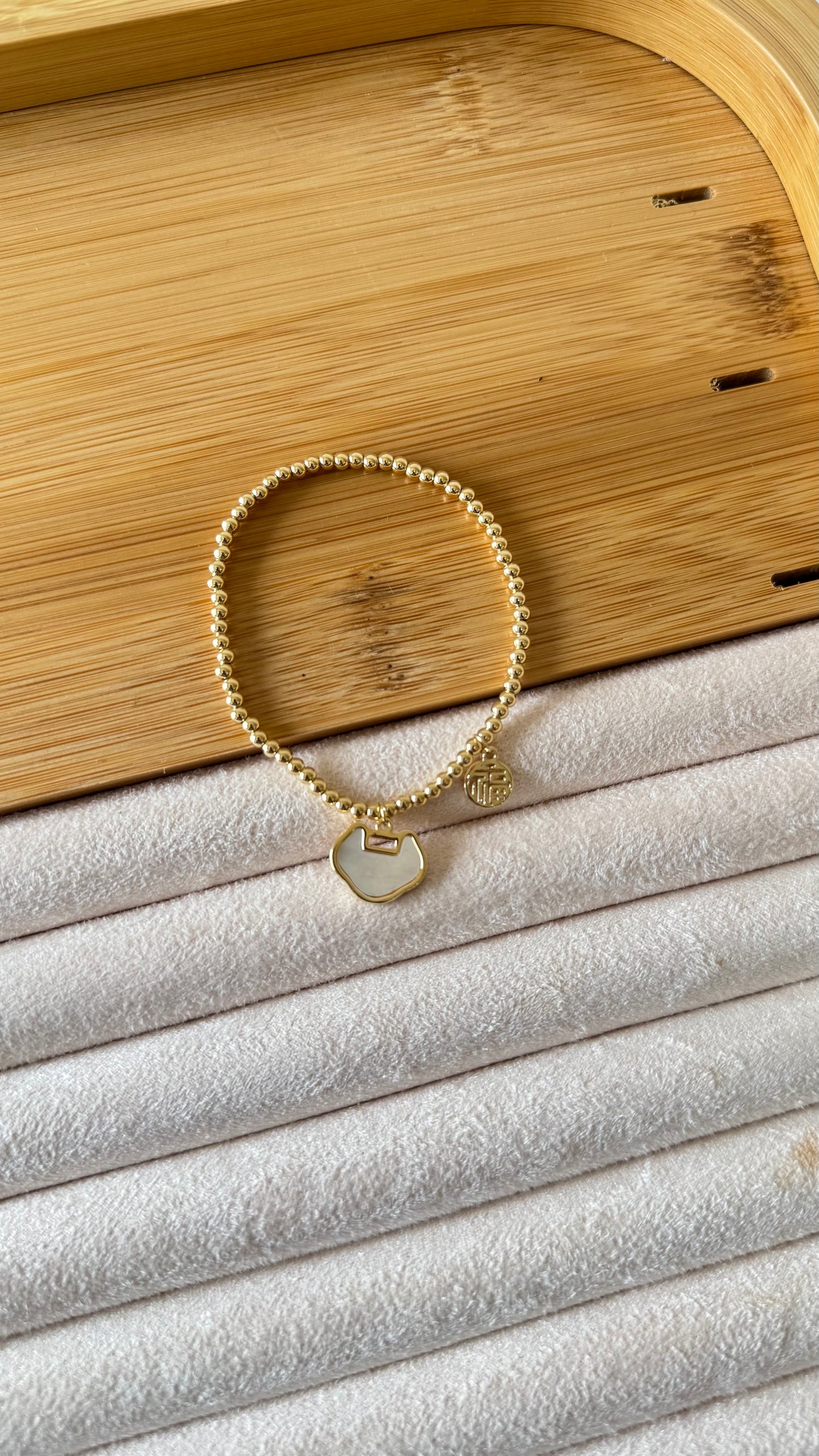 BRACELET A MEDAILLE